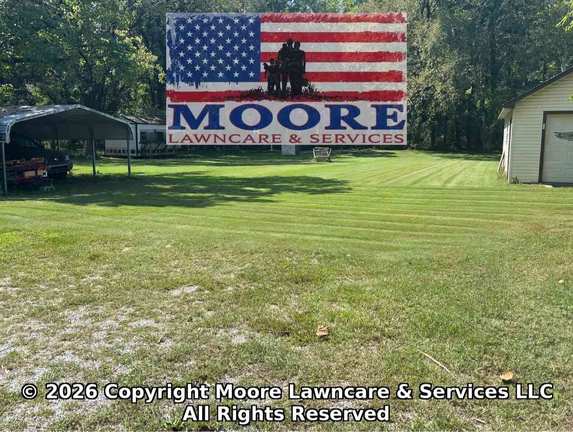 Bright striped lawn completed by Moore Lawncare